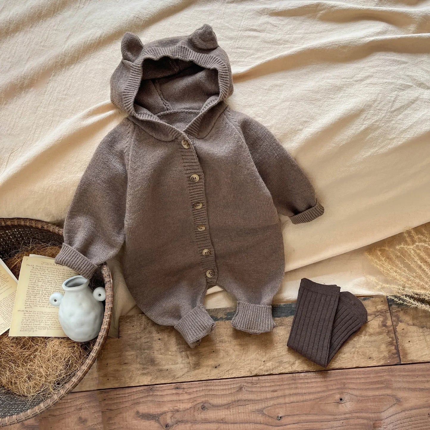 Bambino's Gebreide Knopen Onesie