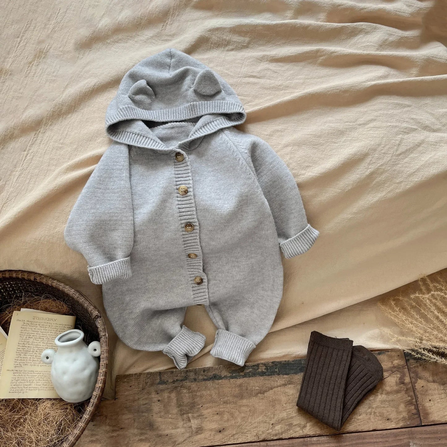 Bambino's Gebreide Knopen Onesie