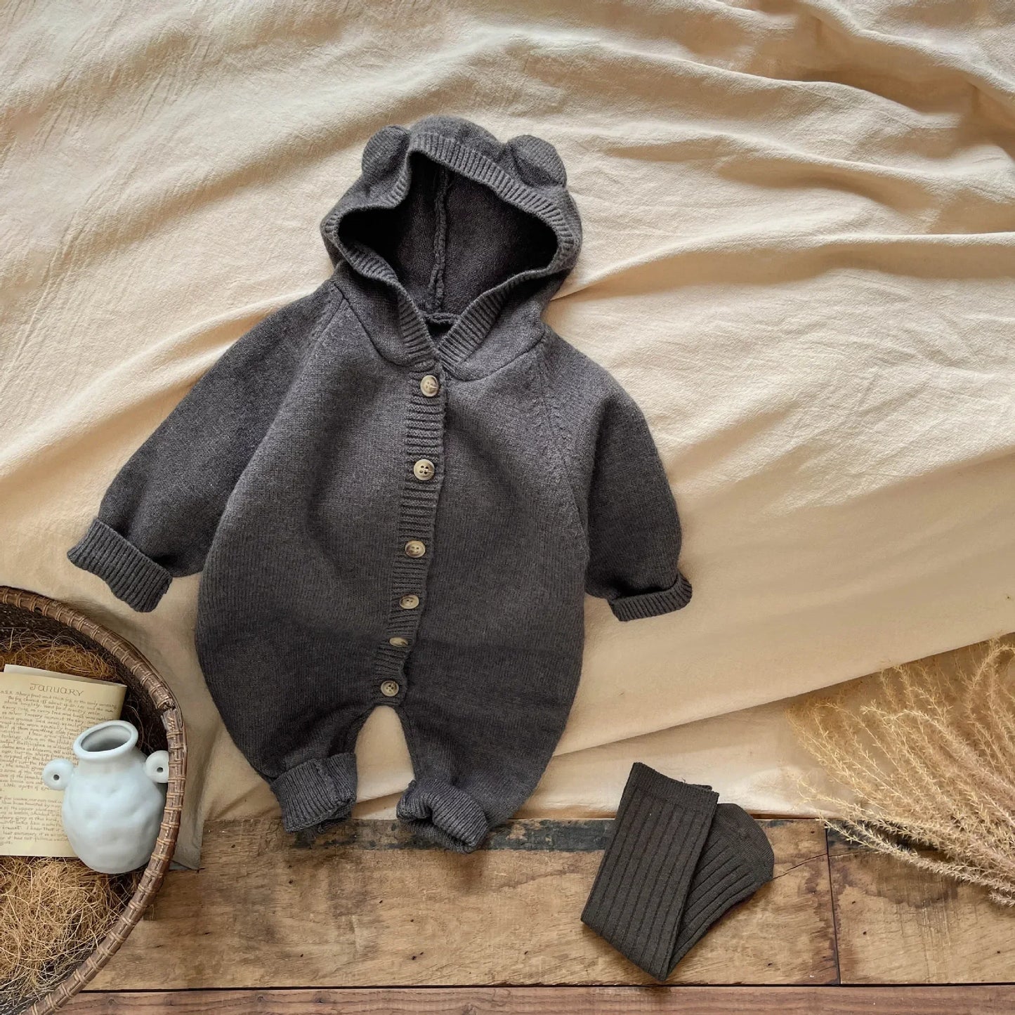 Bambino's Gebreide Knopen Onesie