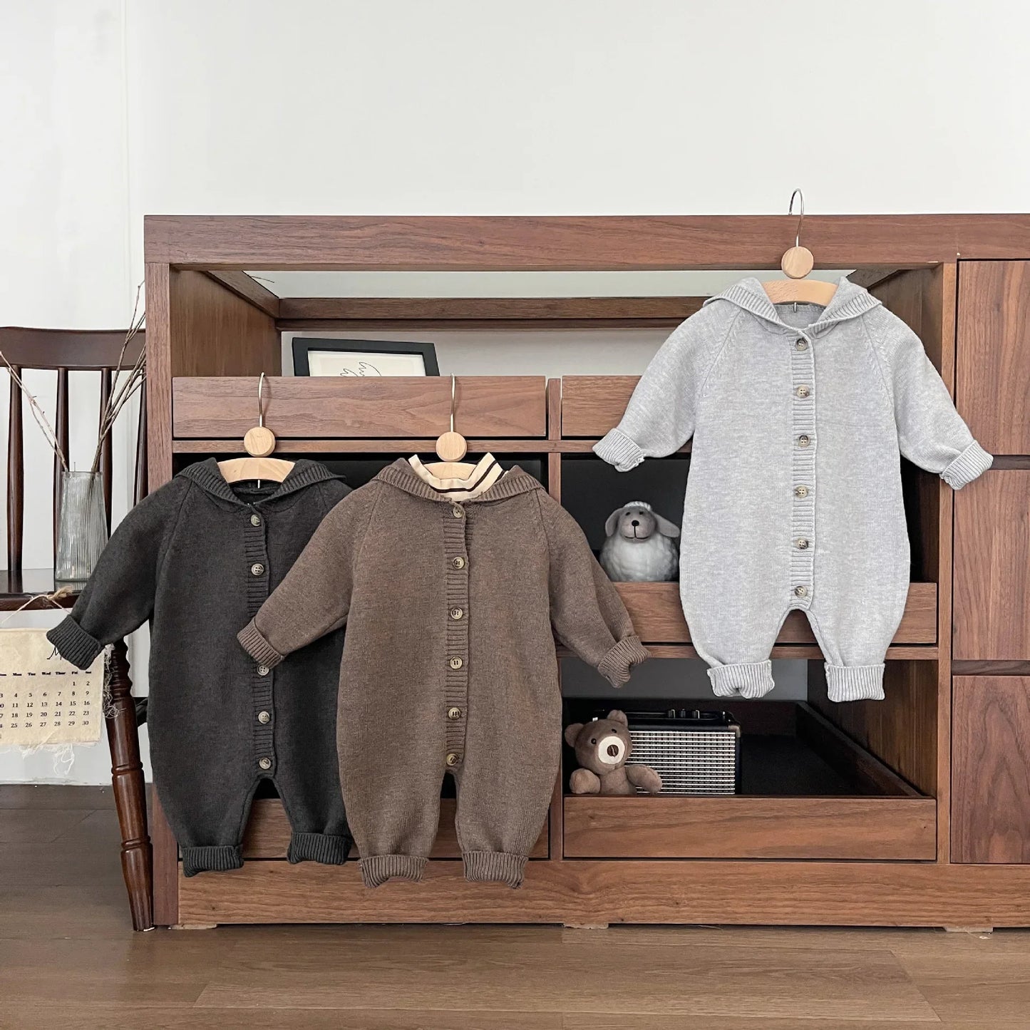 Bambino's Gebreide Knopen Onesie